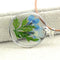 FM FM42 Pressed blue dried flower and green leaf round pendant necklace FN4004, metallic, gemstone free