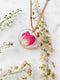 Preserved wild flower rose heart pendant