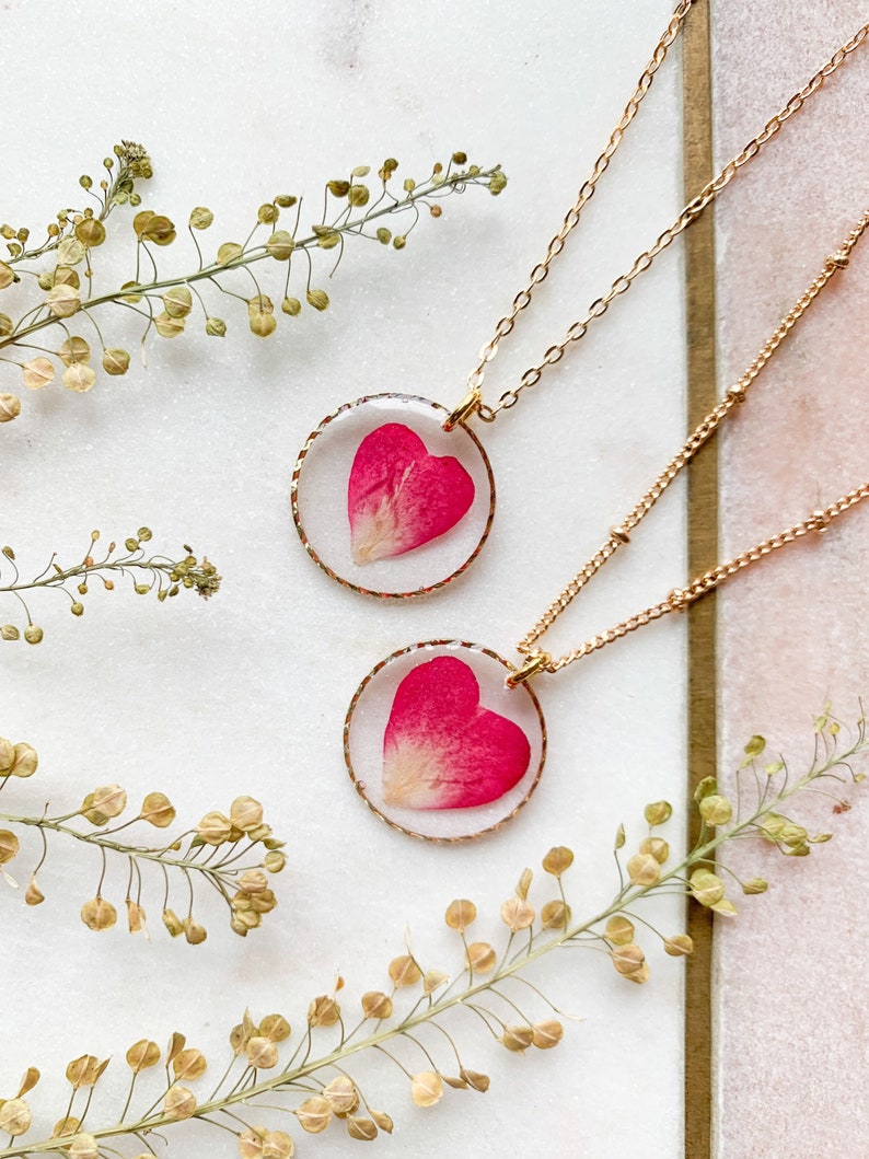 Preserved wild flower rose heart pendant