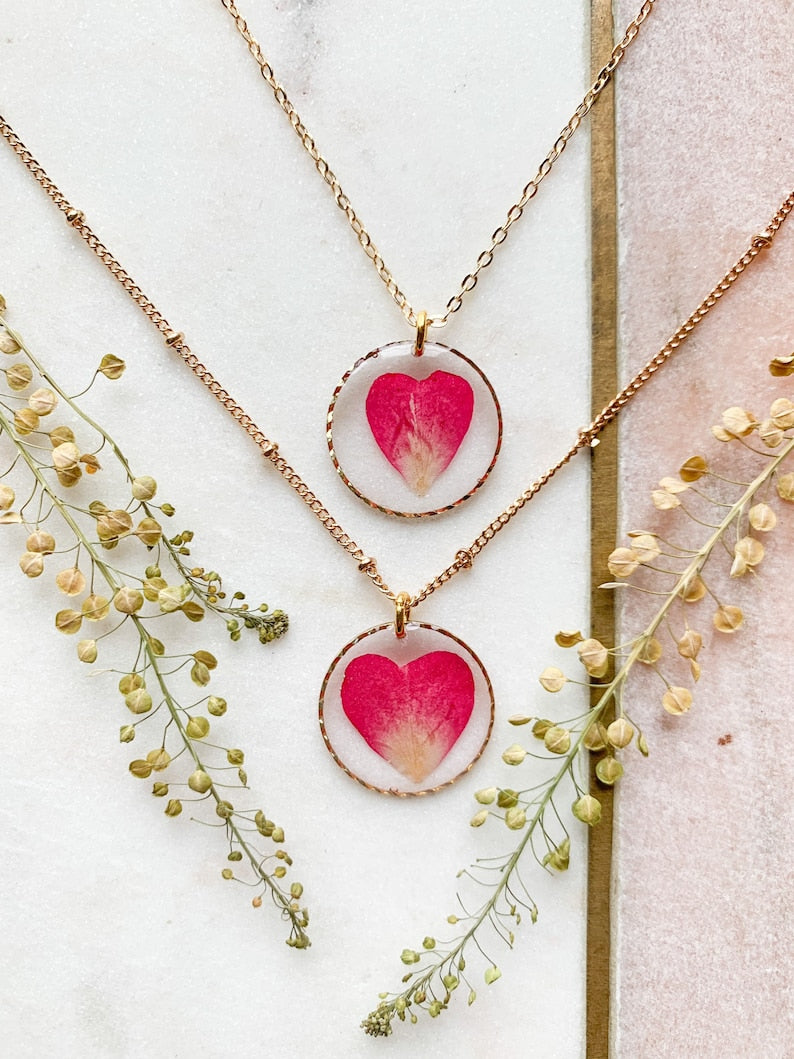 Preserved wild flower rose heart pendant