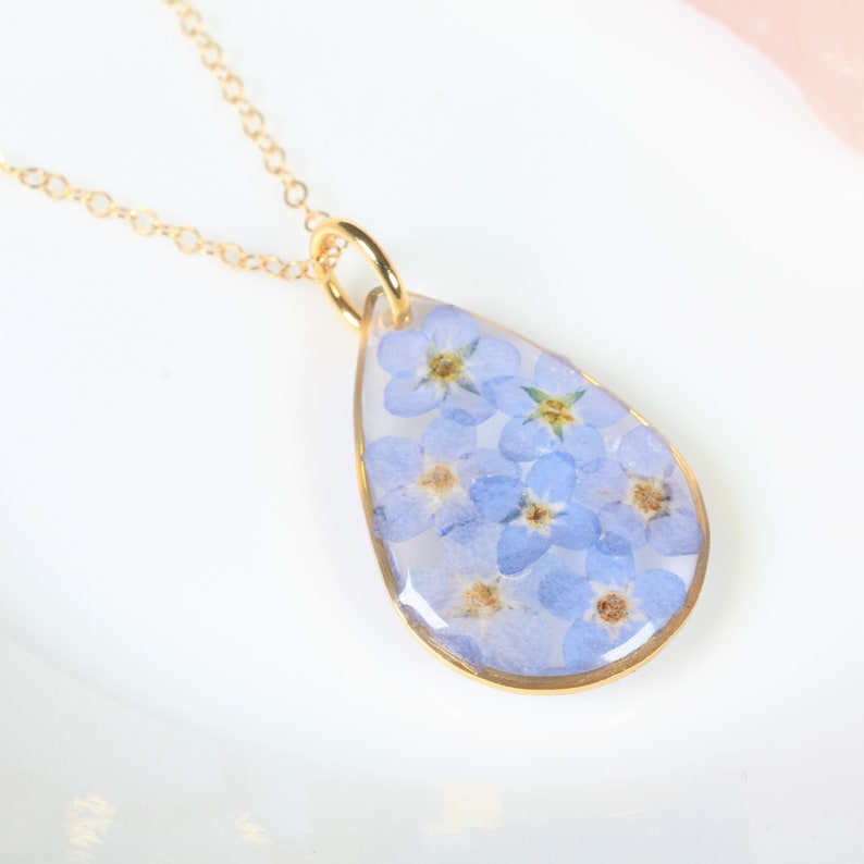 Gold forget-me-not necklace, real pressed flower teardrop pendant, handmade resin jewelry, blue forget me nots, dried botanical necklace